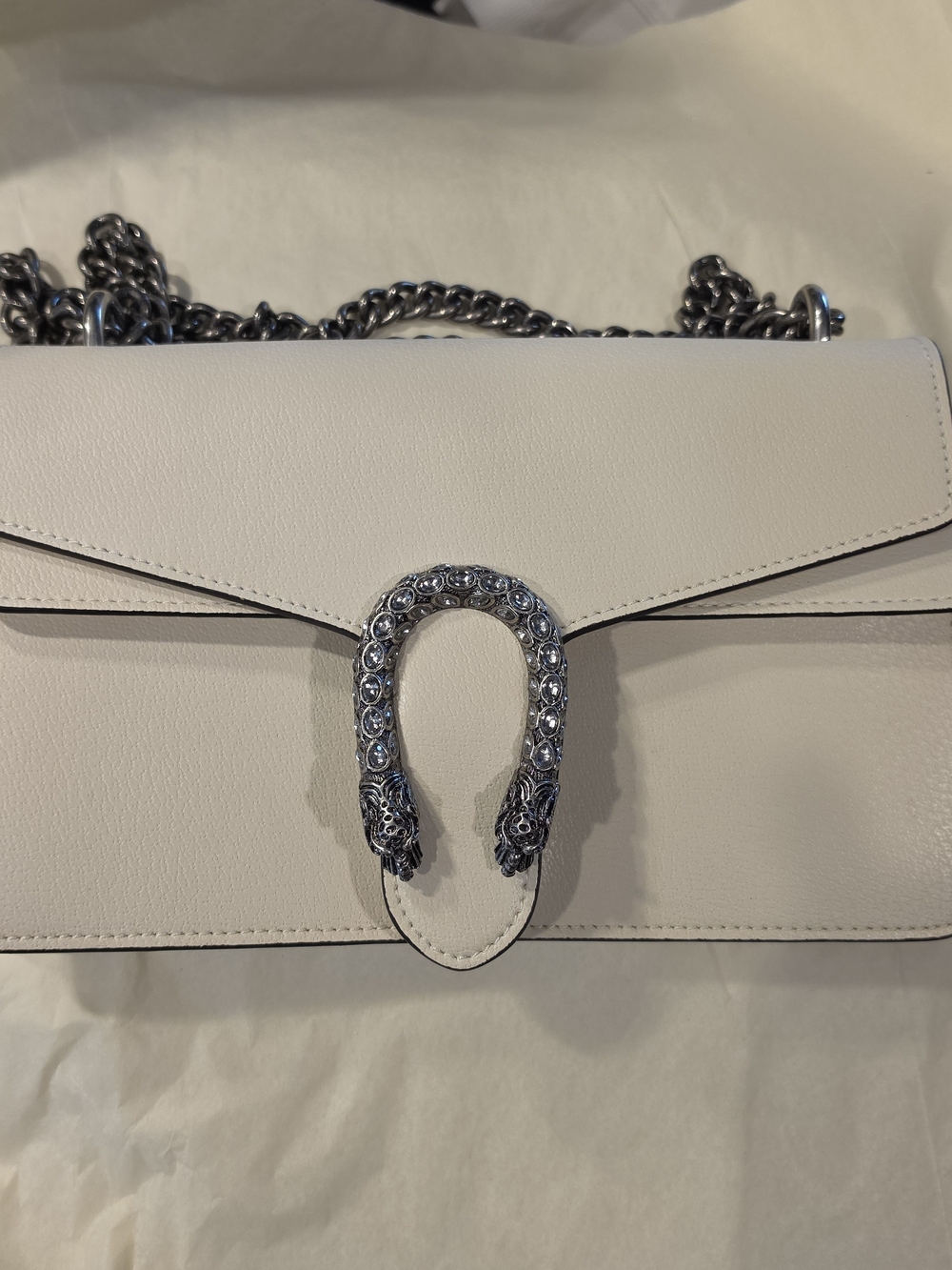 White Leather Shoulder Bag with Decorative Silver Horseshoe Accent